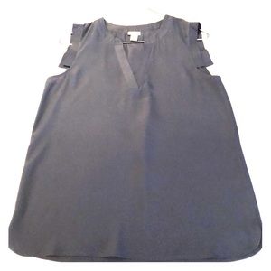 Great top to wear to work or play.